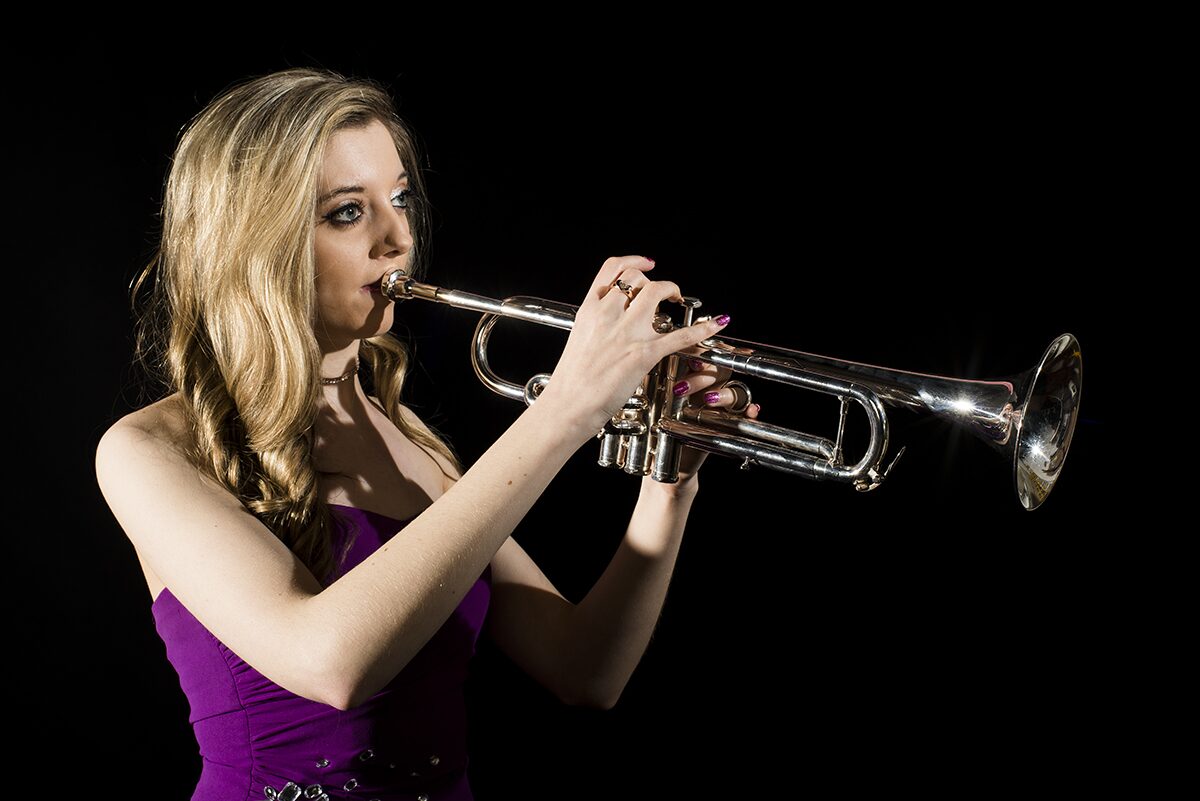 Jem Andrews performing on trumpet