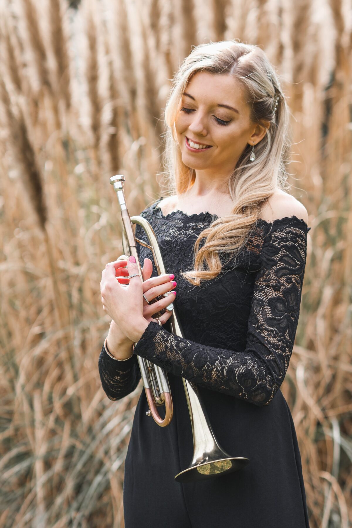 Jem Andrews portrait with trumpet