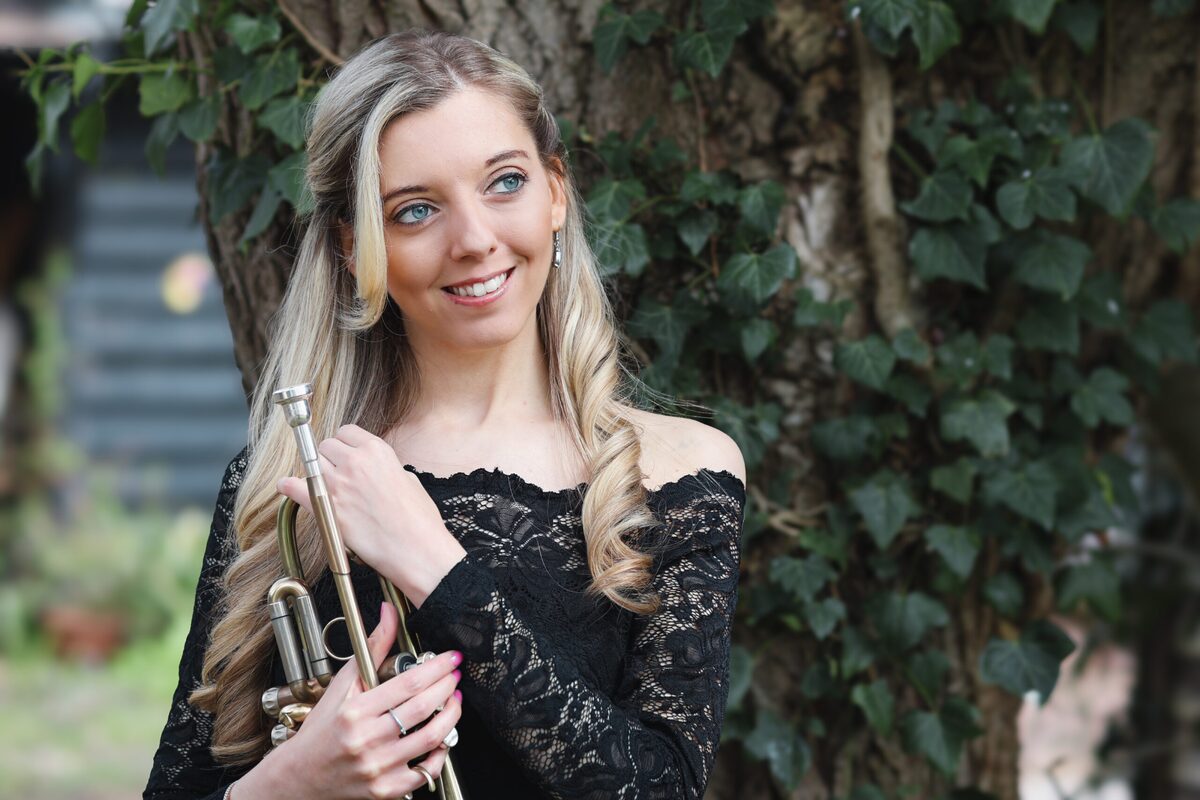 Jem Andrews outdoor portrait with trumpet
