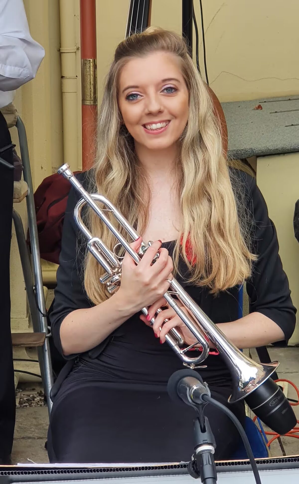 Jem Andrews portrait with trumpet