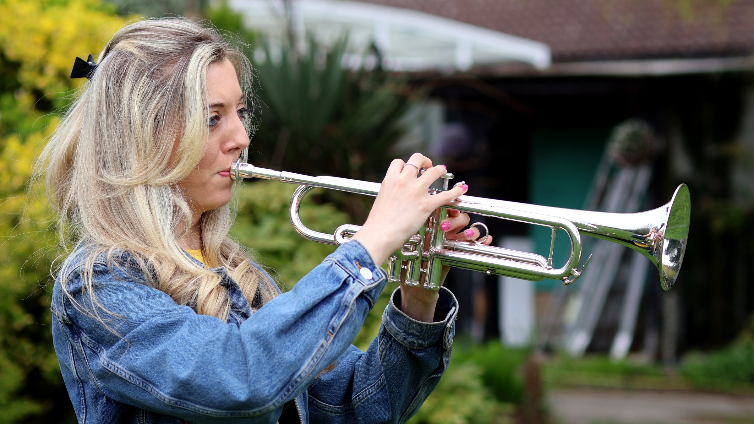 Jemma Andrews with trumpet — Projects hero image.
