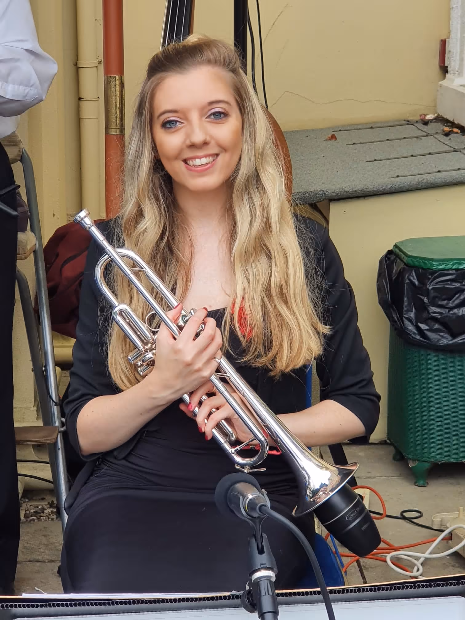 Jemma Andrews portrait with trumpet